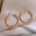 Broken silver unique circle earrings women's niche light luxury design ear buckle 2024 new popular high-end earrings