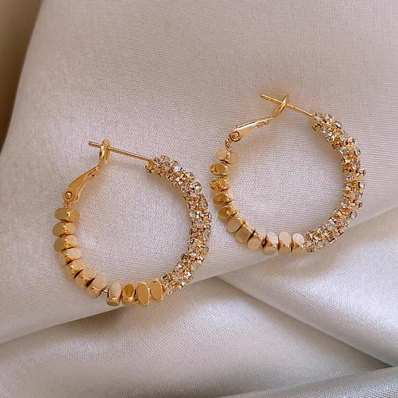 Broken silver unique circle earrings women's niche light luxury design ear buckle 2024 new popular high-end earrings
