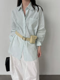 Korean simple casual high-end solid-color cotton shirt women's new spring lazy top
