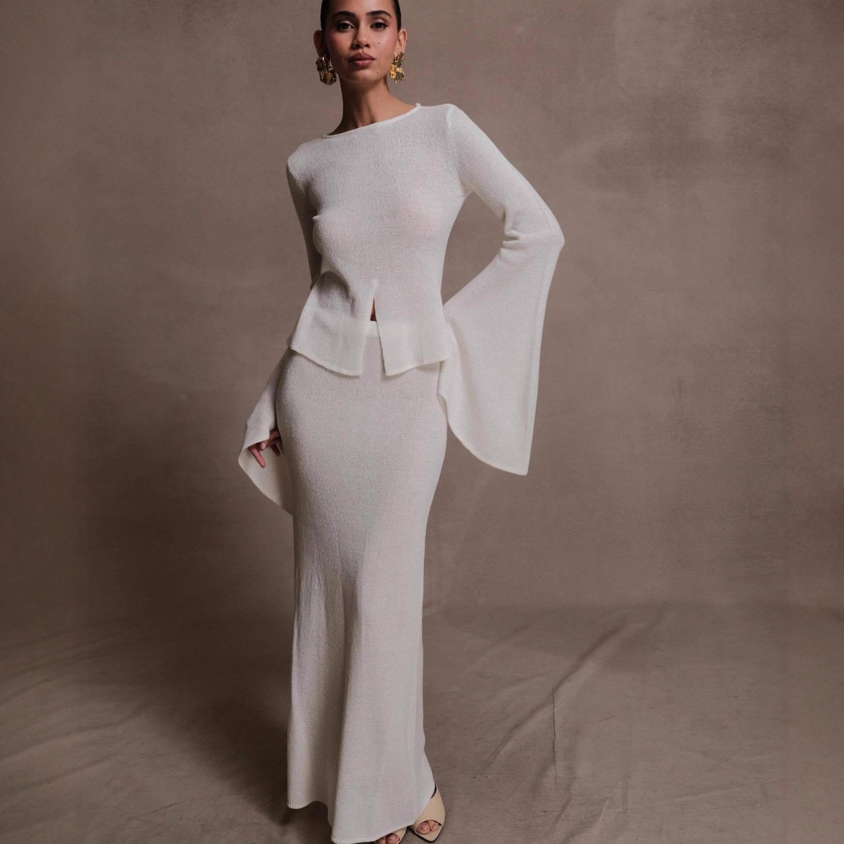 Wind women's clothing fashionable and sexy horn-sleeved top, hip-wrapped long skirt, two-piece skirt set