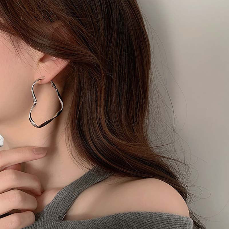 Korean silver love earrings earrings 925 silver needle light luxury high-end niche design earrings factory direct sales