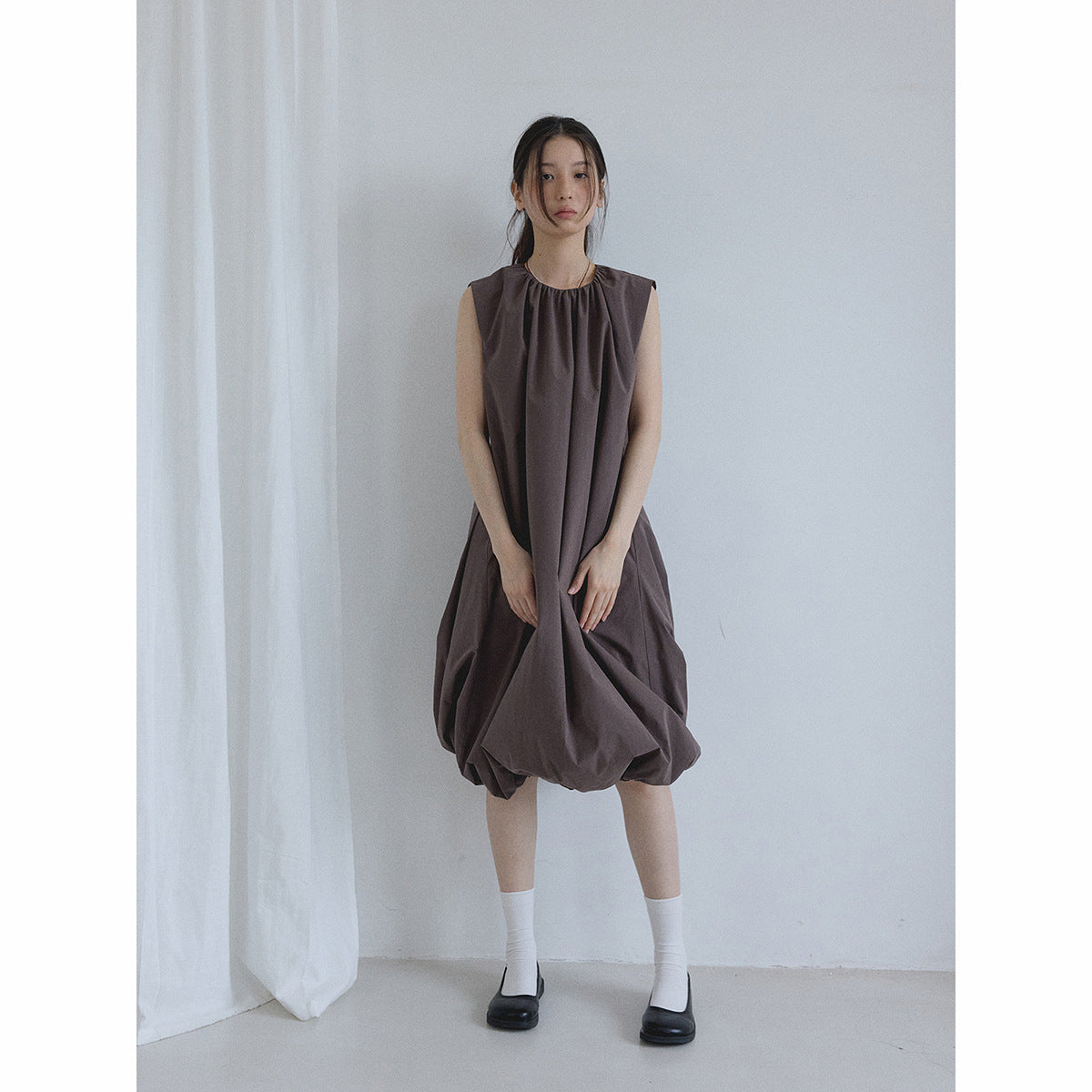Summer new casual round neck easy and simple small fly sleeves solid color vest bubble skirt