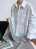 Autumn French casual simple solid color shirt women's lazy loose silhouette design sense stacked shirt