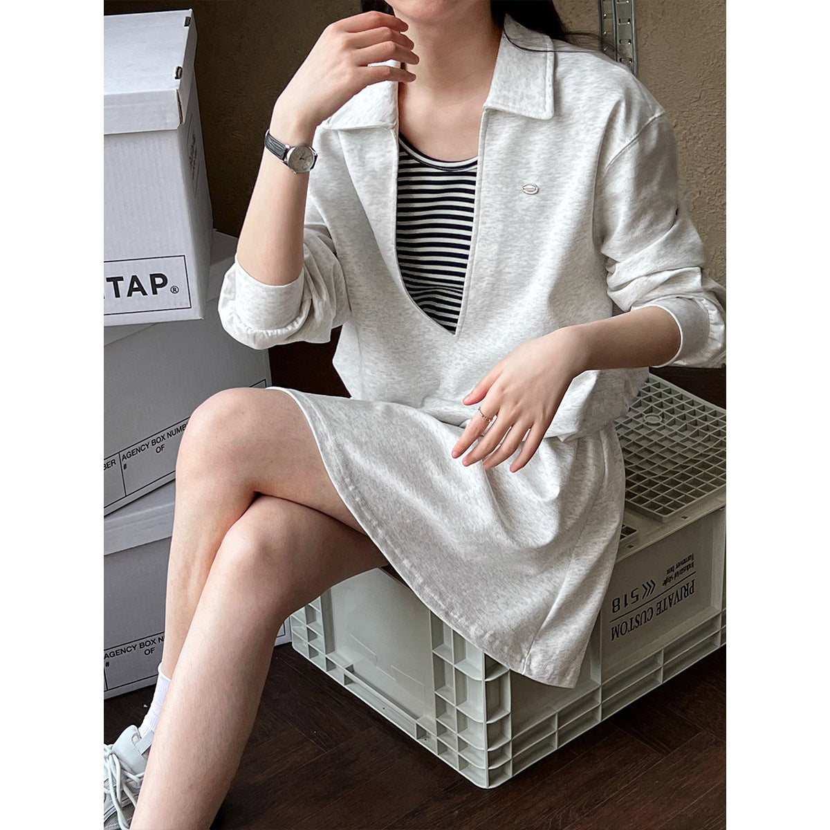 Korean age-reducing suit women's autumn new fake two-piece sweater + elastic skirt two-piece set