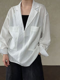 Minimalist design V-neck loose shirt women's early autumn new commuter trendy top