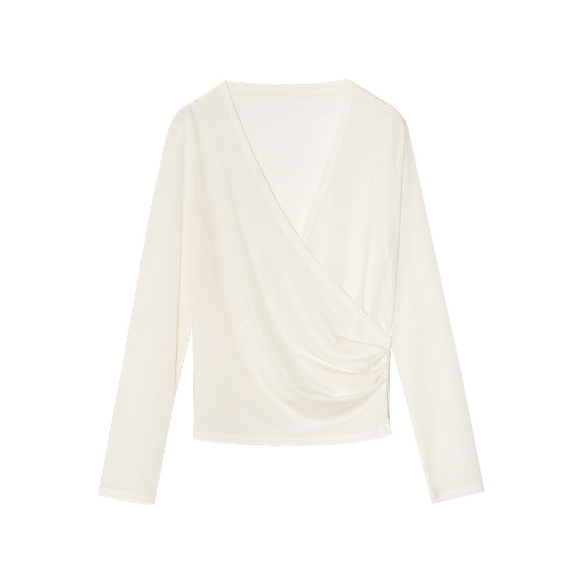 Spring French age-reducing cross V-neck long-sleeved irregular hem bottoming shirt