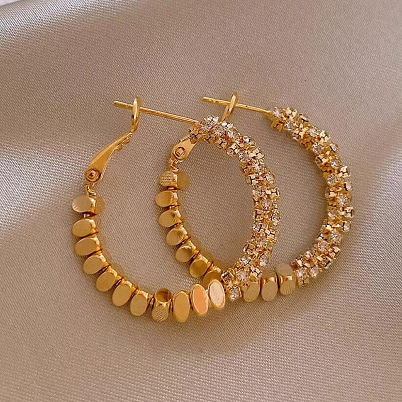 Broken silver unique circle earrings women's niche light luxury design ear buckle 2024 new popular high-end earrings