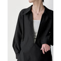 Design sense large v-neck loose casual long-sleeved shirt women's early spring new stacked French top