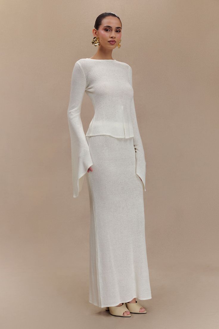 Wind women's clothing fashionable and sexy horn-sleeved top, hip-wrapped long skirt, two-piece skirt set