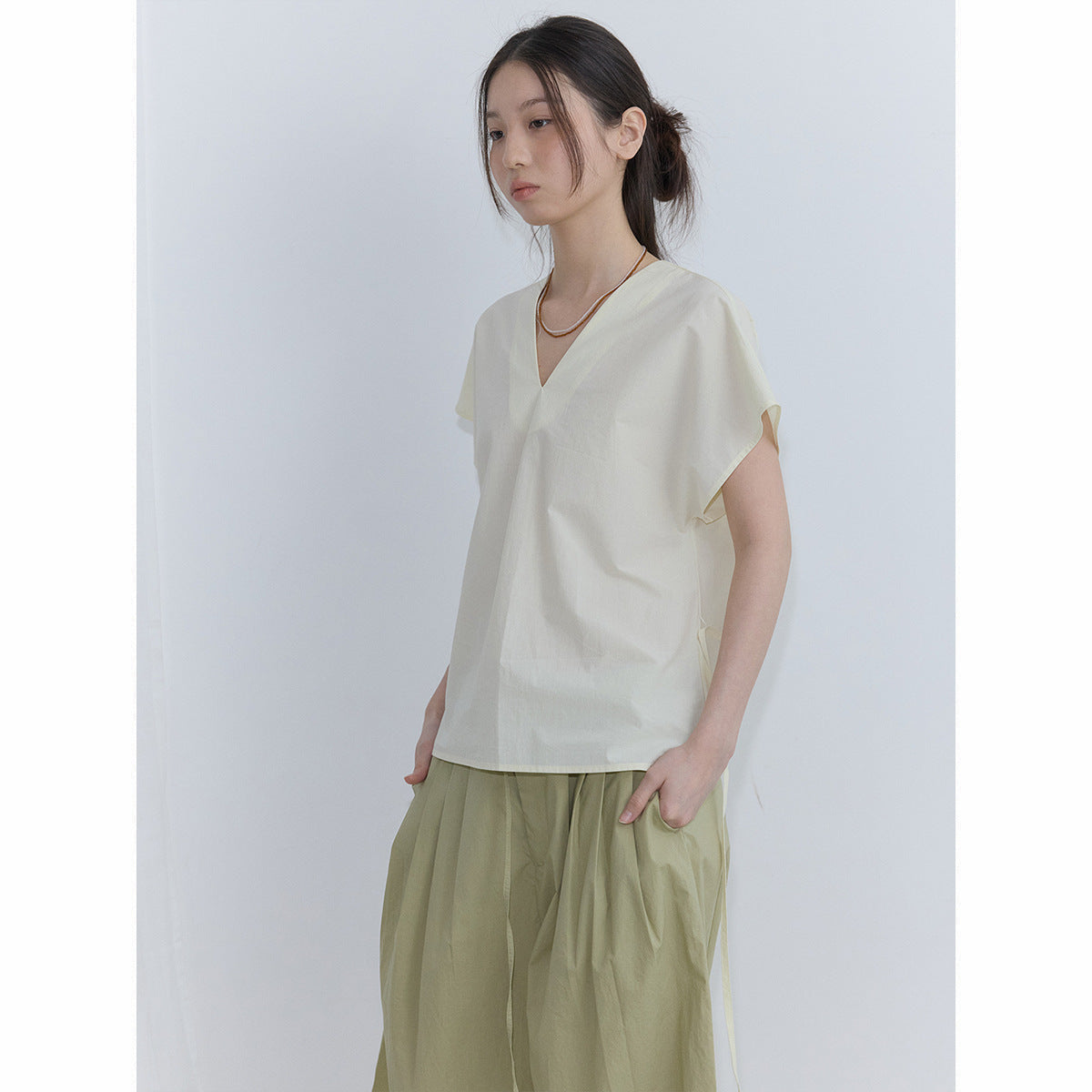 Summer new casual V-neck simple and transparent cotton one-sleeved solid color strap short-sleeved top