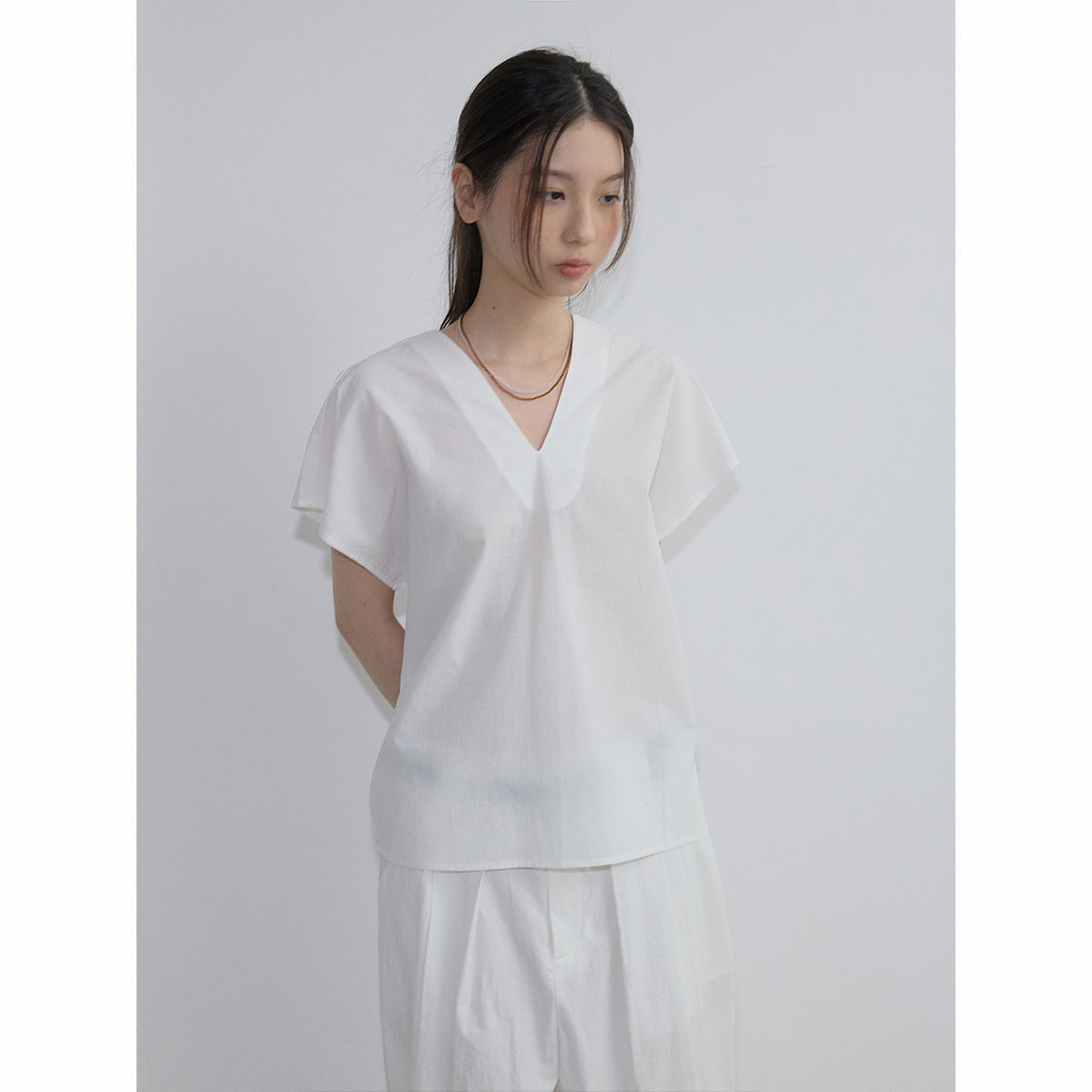 Summer new casual V-neck simple and transparent cotton one-sleeved solid color strap short-sleeved top