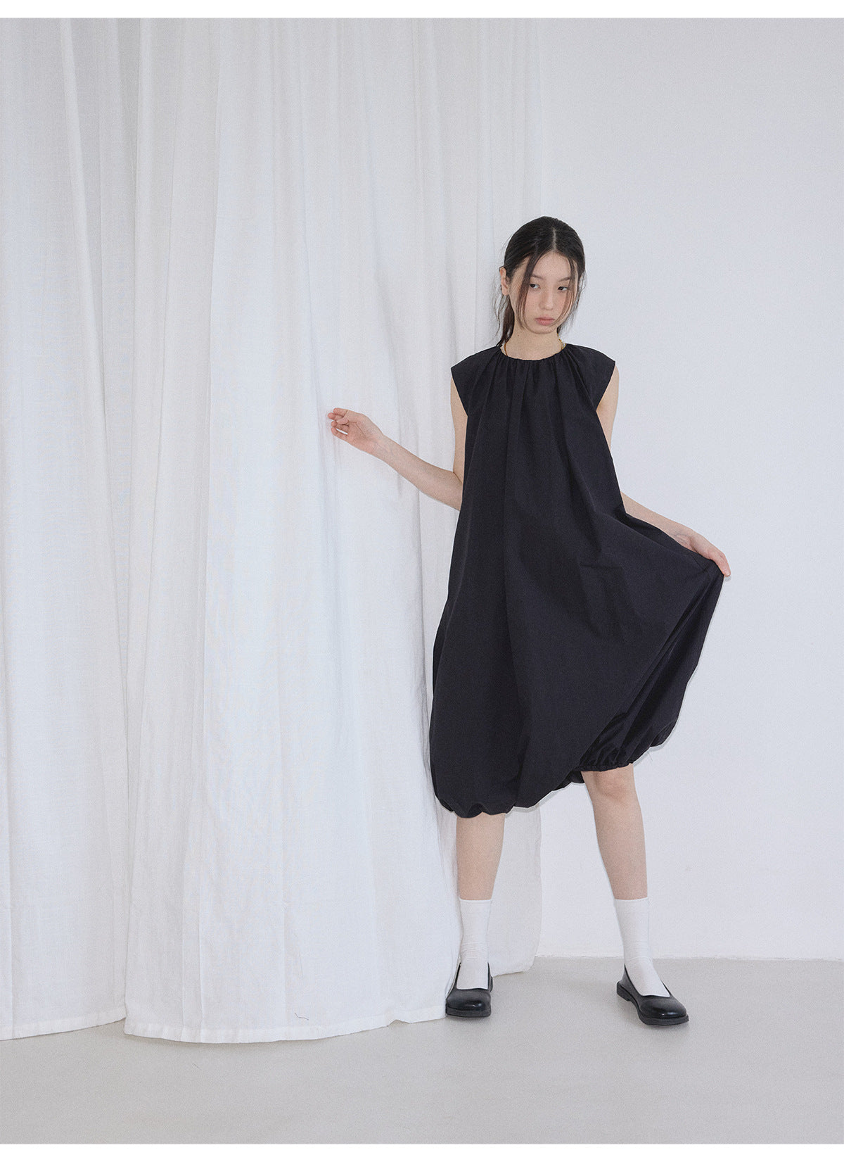 Summer new casual round neck easy and simple small fly sleeves solid color vest bubble skirt